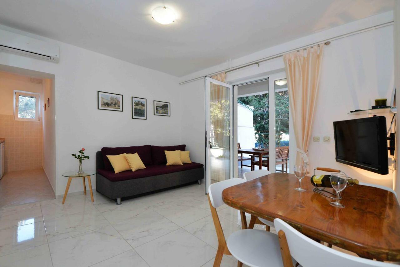 Apartmani Dora ムルテル エクステリア 写真