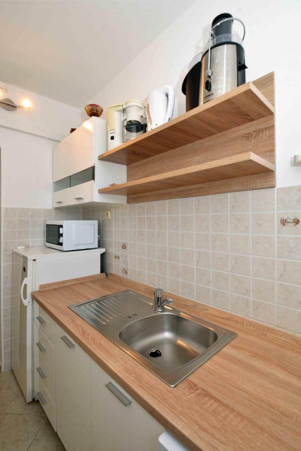 Apartmani Dora ムルテル エクステリア 写真