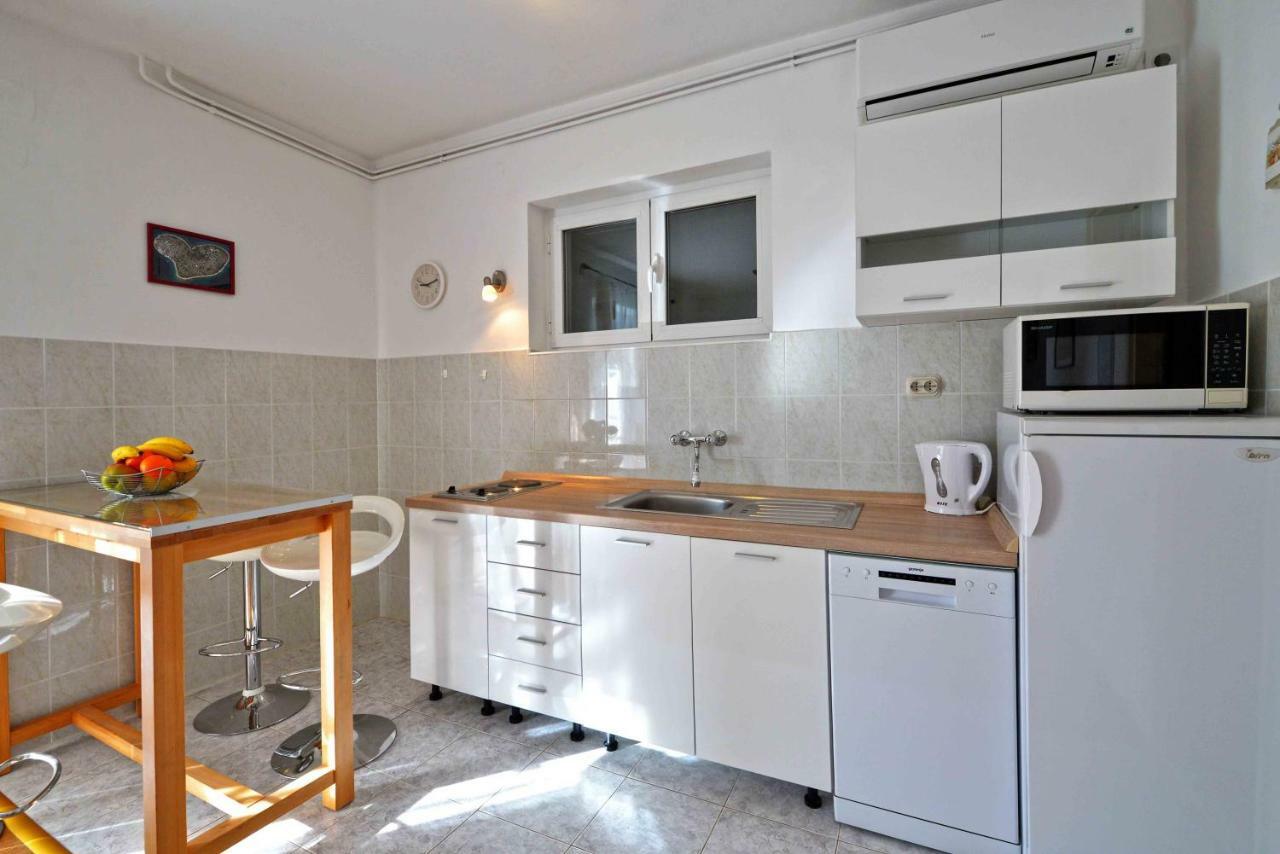 Apartmani Dora ムルテル エクステリア 写真